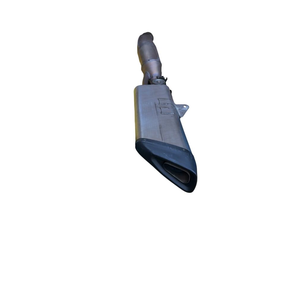 . motorcycle exhaust system, specifically an SC-Project exhaust for an Aprilia